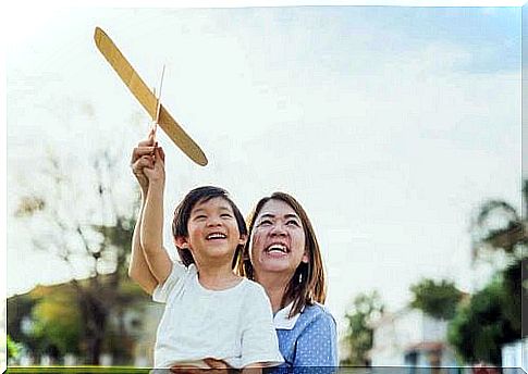 mother and son playing